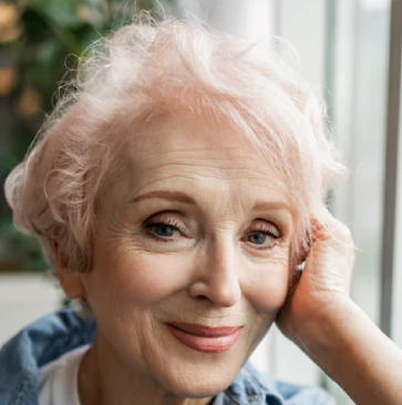 Woman showing a relaxed expression with improved eye comfort after using Crystal Vision supplement and enjoying daily visual clarity